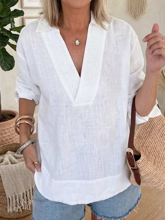 Blusa de algodão e linho com decote em V, minimalista e aconchegante