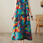 Vestido midi largo, sem mangas, xadrez multicolorido e com decote redondo.