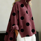 Blusa de ganga elegante com estampado artístico de bolinhas e gola alta