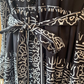 Vestido de menina solto estampado com decote em V