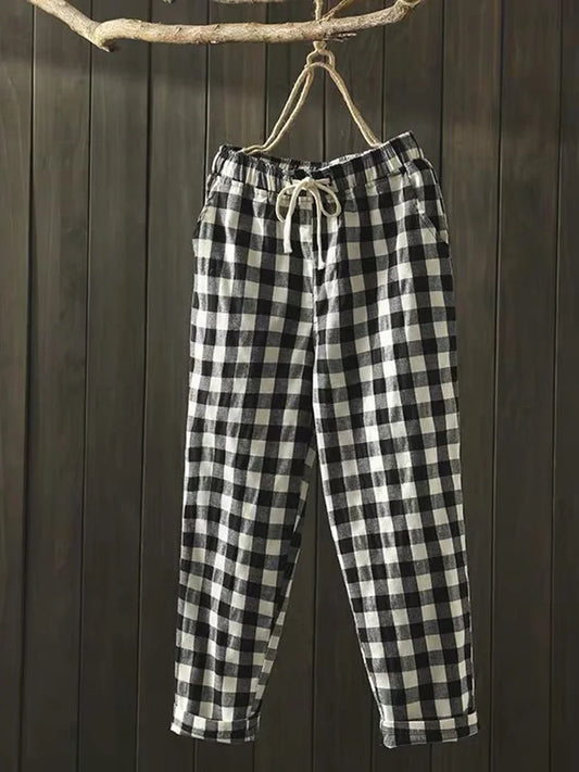 Calças vintage xadrez com cintura elástica e cordão