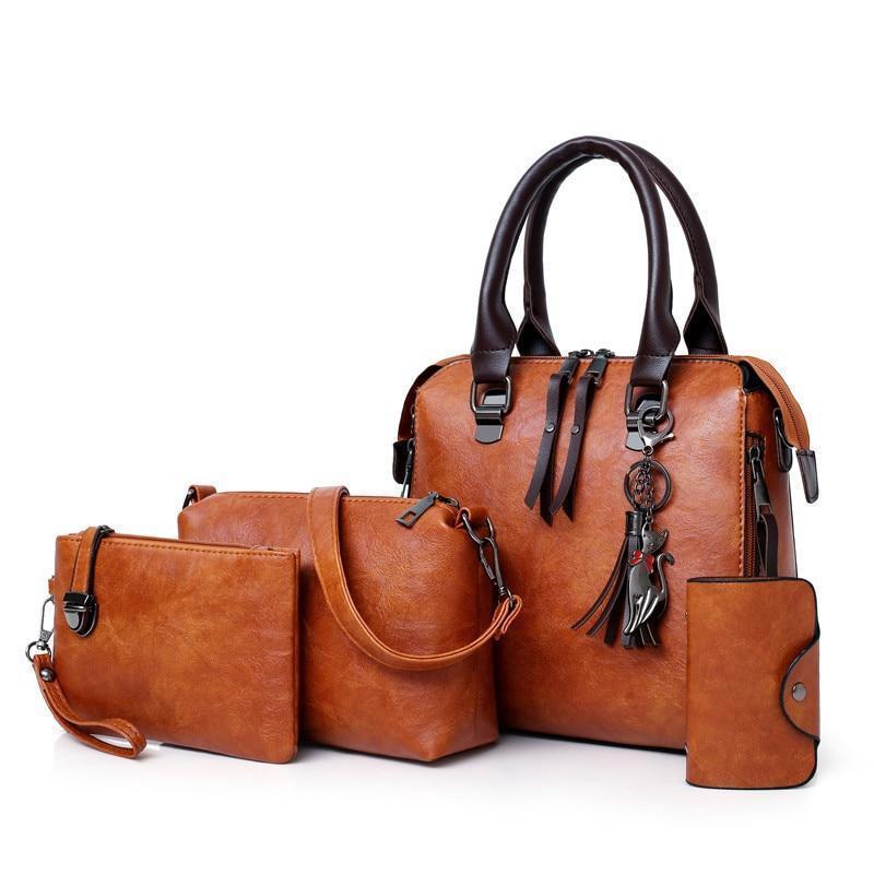 Disponível exclusivamente em conjunto de 🔥4 peças. Bolsa de senhora em couro. 2026